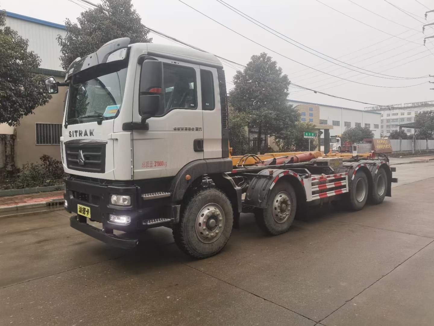 重汽汕德卡前四后八勾臂式垃圾車